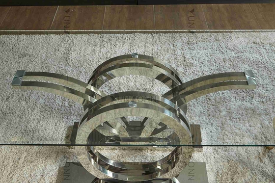 Seagulls Design Luxury Modern ชุดโต๊ะรับประทานอาหารกระจกด้านบน 4 ที่นั่งโครงฐานสแตนเลสสีเงิน
