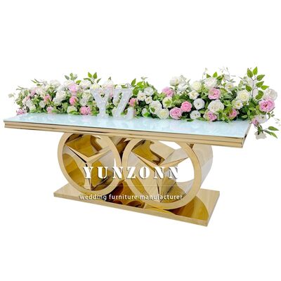 ราคาดี โต๊ะทานอาหารสี่เหลี่ยมผืนผ้าสีทองสไตล์โมเดิร์นพร้อมฐานเบนซ์ เฟอร์นิเจอร์หรูสำหรับจัดงานแต่งงานกลางแจ้งและโรงแรม ท็อปกระจก/MDF ออนไลน์