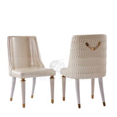 ราคาดี ขายร้อน เก้าอี้อาหารหนังที่ทันสมัยสําหรับใช้ในภายในและภายนอกด้วยรองแขนสแตนเลสสําหรับโรงแรมและห้องนั่งเล่น ออนไลน์